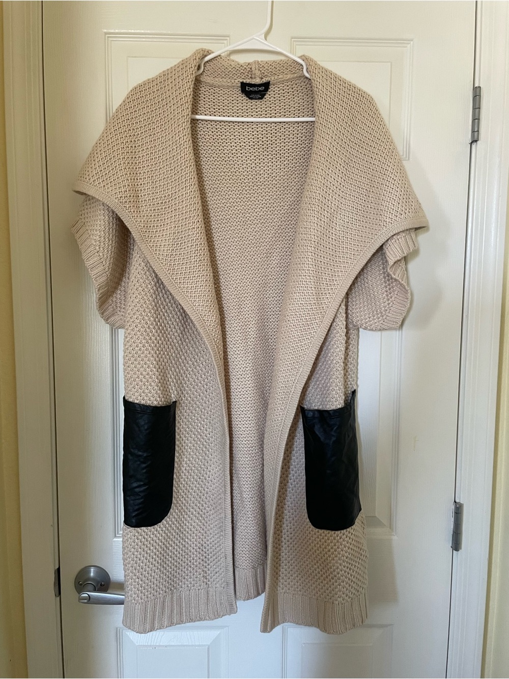 bebe Cream Knit Open-Front Cardigan with Black Pocket Accents